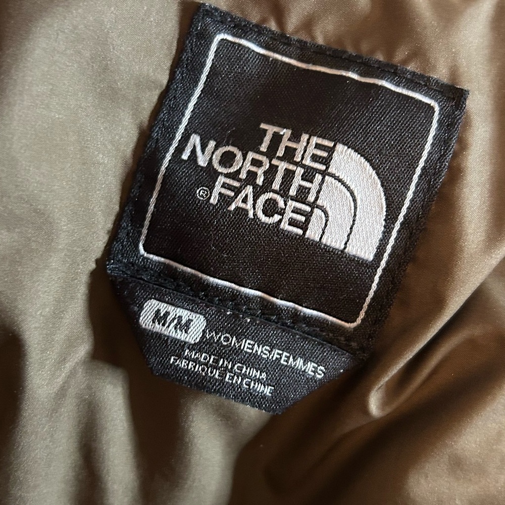 The North Face brown Puffer Jacket. Stove sack. 700.  One repair - Picture 15 of 16